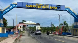 Gapura selamat datang di Kabupaten Batu Bara, ilustrasi wilayah dengan peningkatan kasus HIV hingga 137 kasus pada 2026